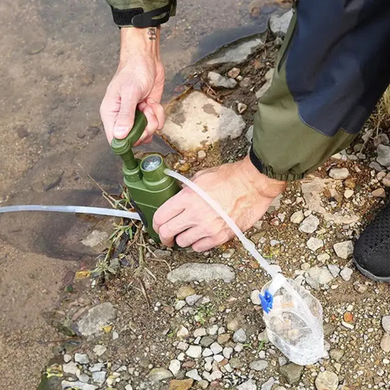 Portable outdoor water filter pump with a 0.01-micron, 3-stage filtration system, suitable for hiking and camping. V.I.P Digital Presence